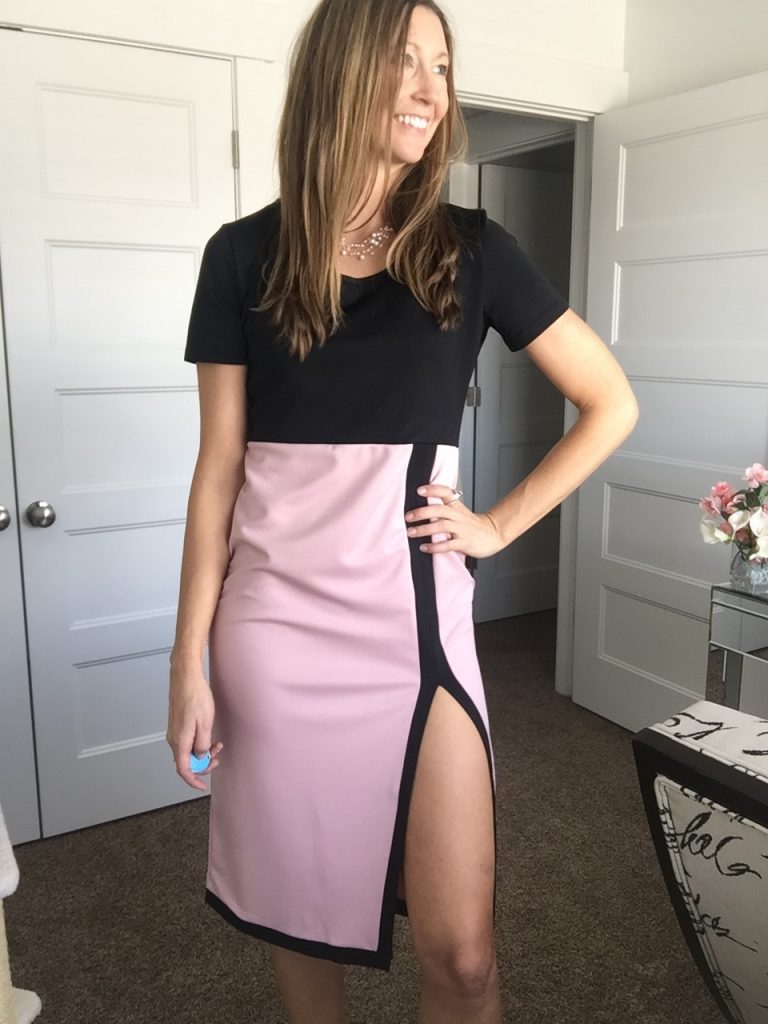 chic pink and black dress with a high slit