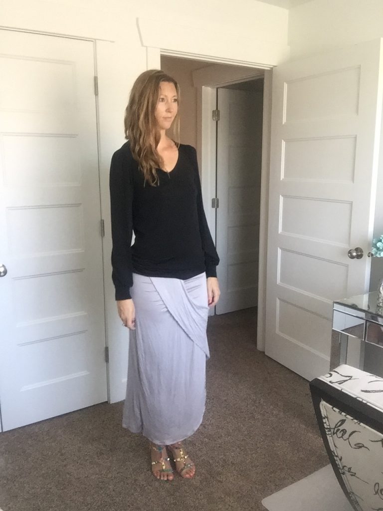 black blouse and gray wrap skirt 