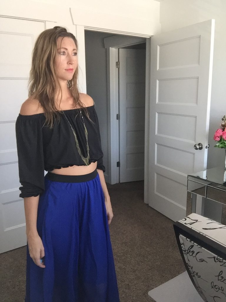 Black off the shoulder crop top and blue chiffon maxi skirt