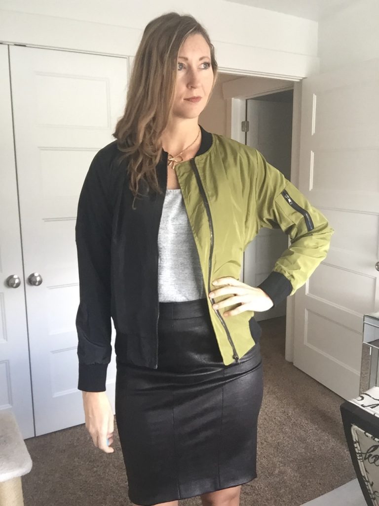 Olive green windbreaker jacket and faux leather pencil skirt 