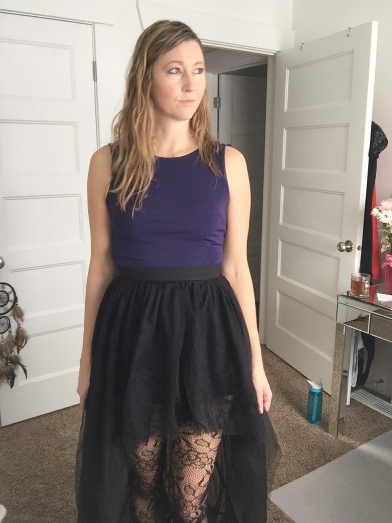 Black hi-low tulle skirt and printed tights