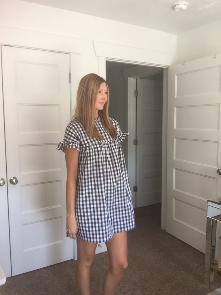 Woman in Gingham Black and White Babydoll Dress