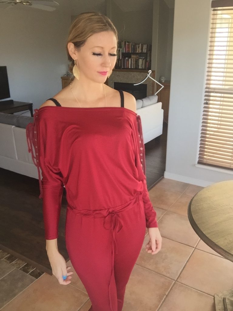 woman in Sexy Red Long Sleeved Jumpsuit