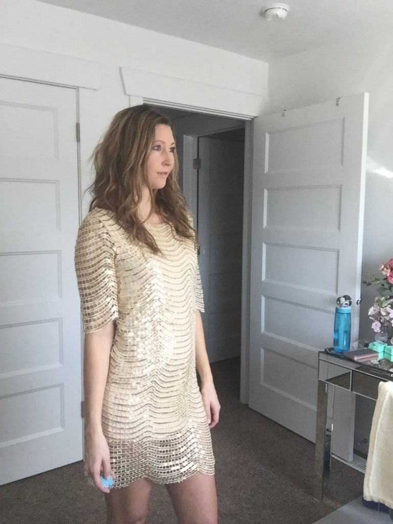 woman in Beige and Gold Sequin Dress