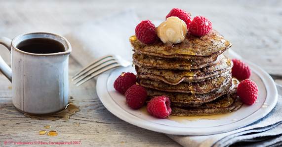 stack of pancakes and berries